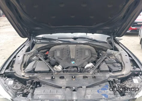 2012 BMW 750Li из США, поврежденный, VIN WBAKB8C57CDX20821